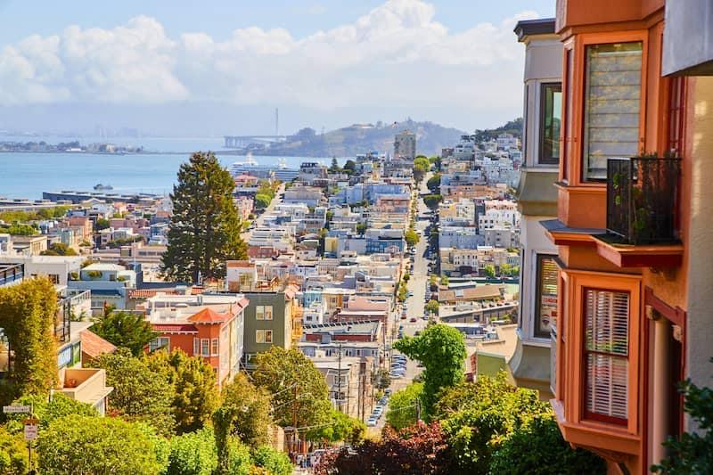 Panoramic view of the San Francisco skyline and Golden Gate Bridge.